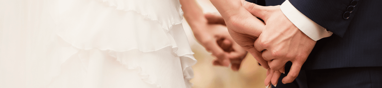 bride-and-groom-holding-hands